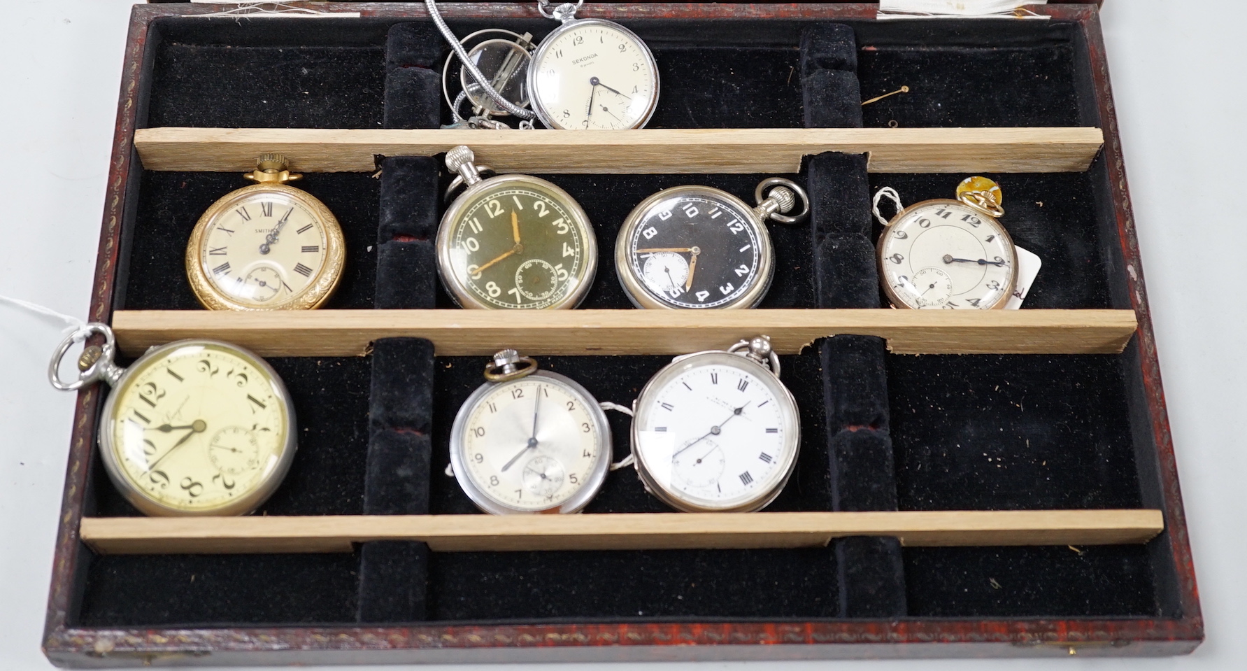 Eight assorted base metal pocket watches including Longines and Acme Lever.